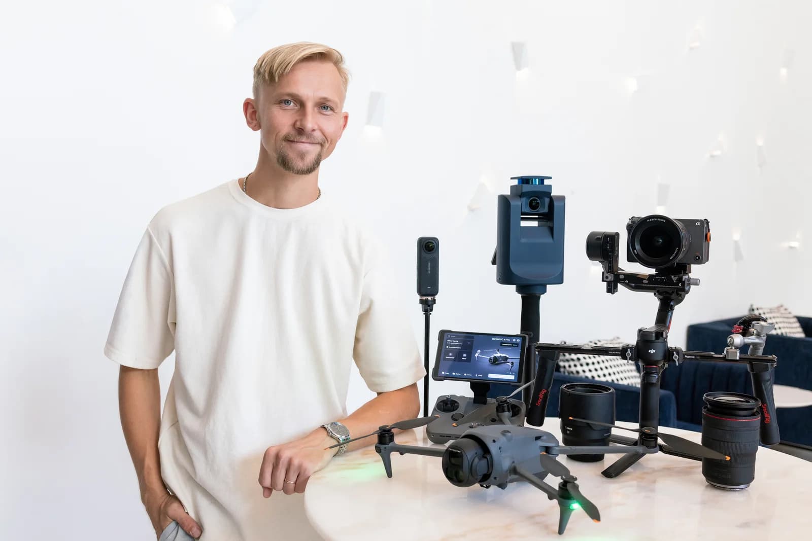TNT photographer with cameras, stabilizer, 3D scanner, drone and lenses