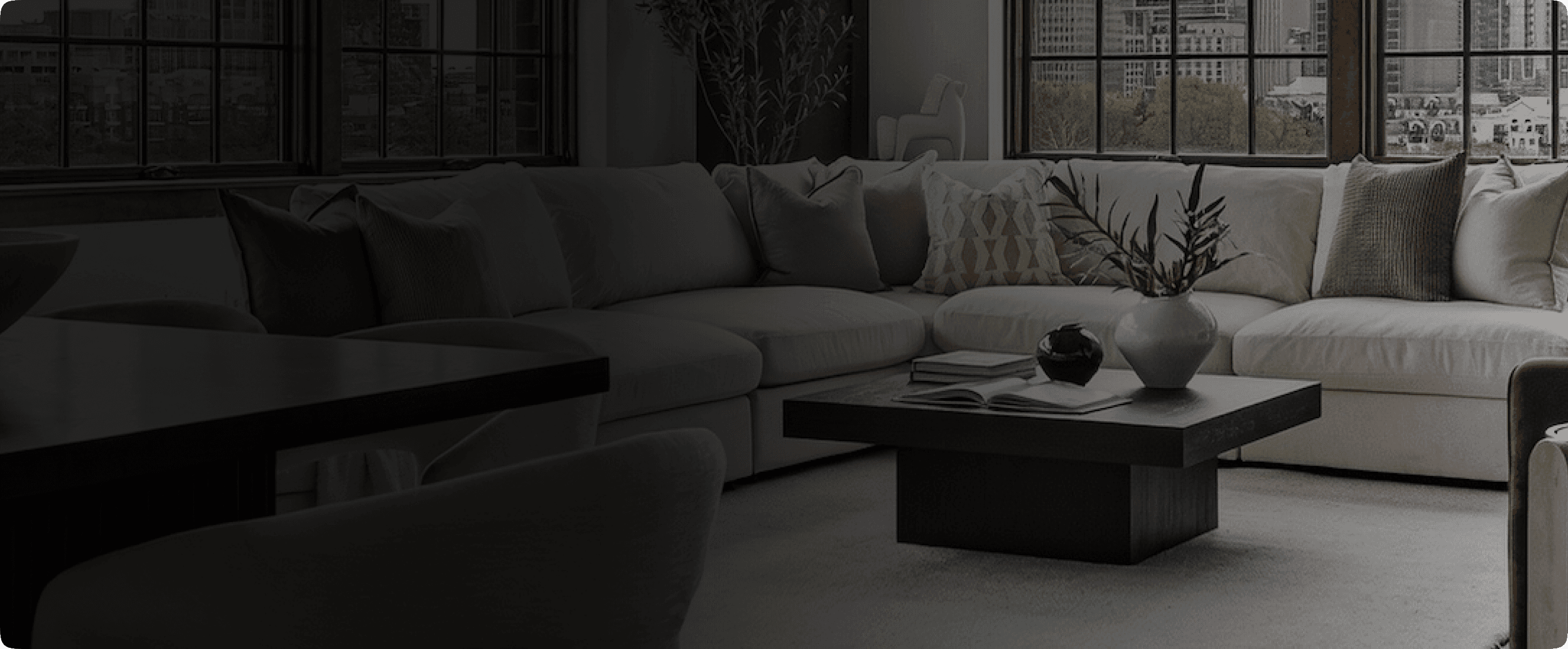 Professionally staged loft living room with TNT Staging highlights